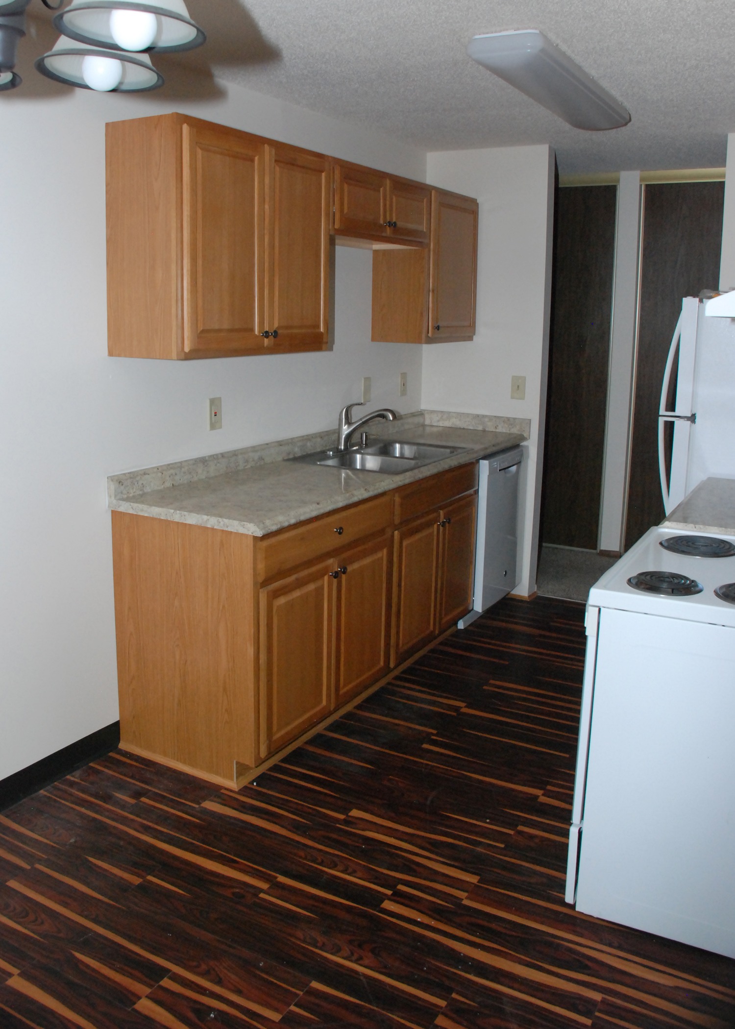 Kitchen inside Rent with Olivers rental units